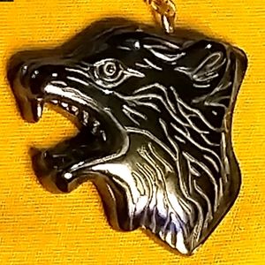 WOMAN-BLACK HEMATITE CARVED WOLF PENDANT STERLING 18" CHAIN. (NC-292276) MEANIN…